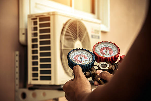 Professional Heat Pump Repair technician working in Hayward, WI
